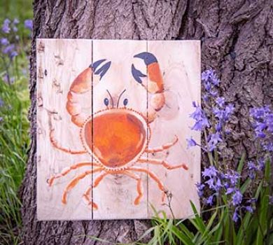 Wooden wall art hand painted with a crab by Liz Corley Art