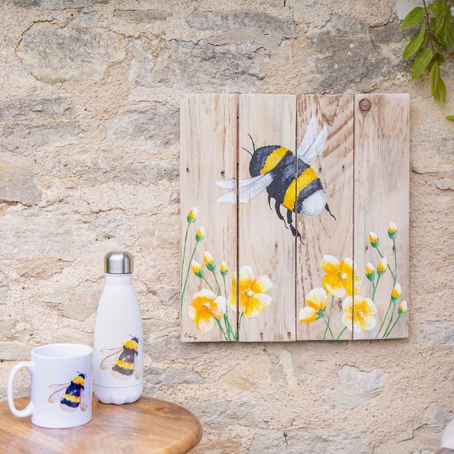 Wooden wall art hand painted with a bumble bee by Liz Corley Art